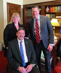 NEPVA Board member Chuck Houle and his wife Eileen with Representative Seth Moulton of Massachusetts.