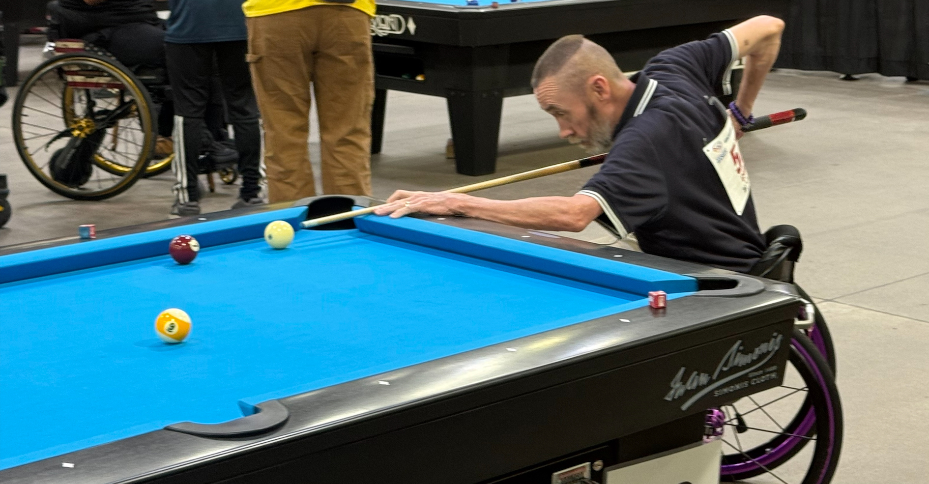 Brad Carlson playing billiards